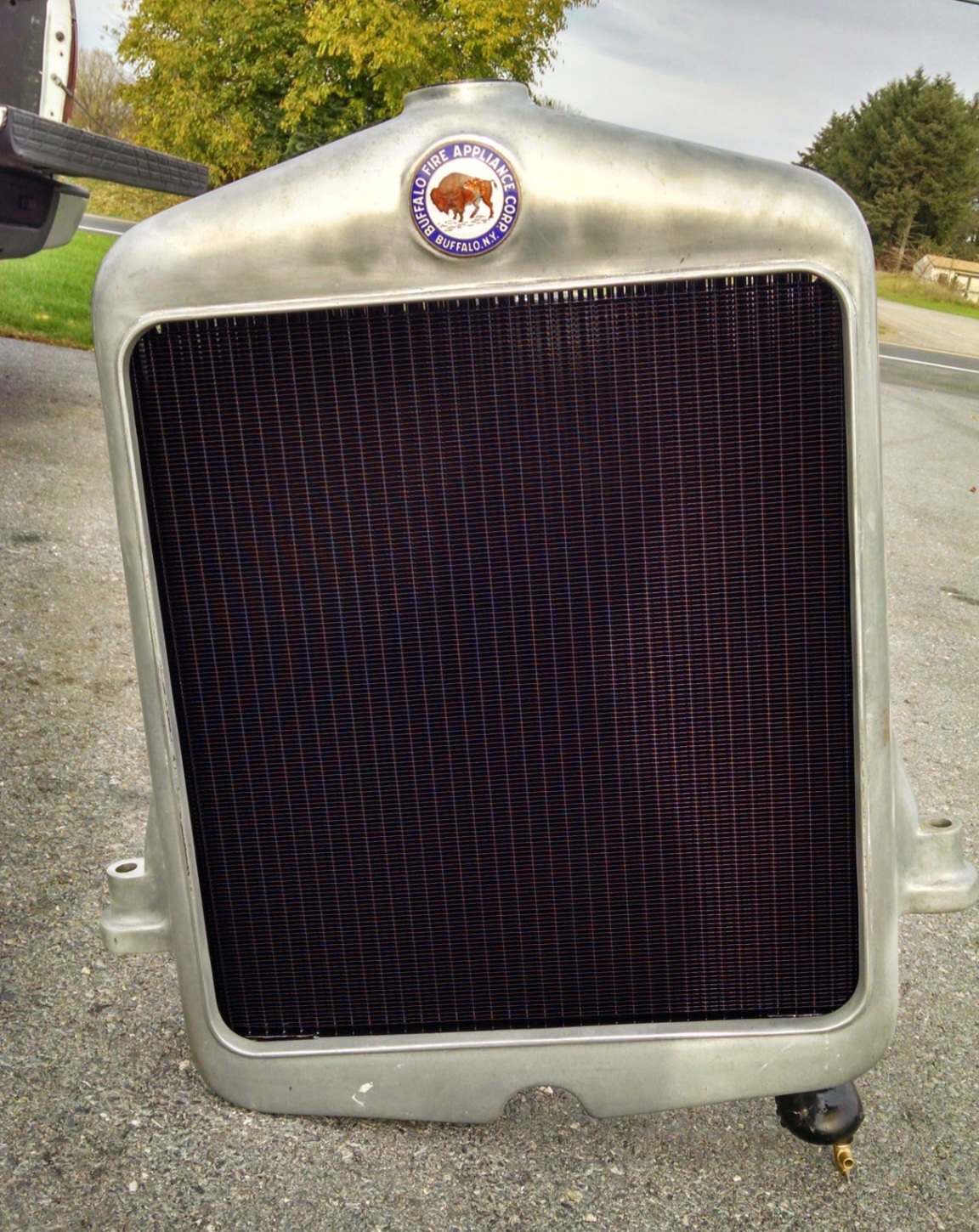 Restored Buffalo Fire Appliance Corp radiator with a new core and polished aluminum shell